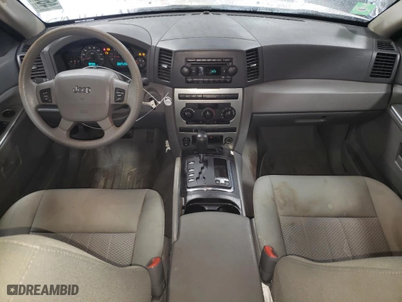 2005 Jeep Grand Cherokee Laredo with VIN 1J4HR48N75C679152, listed as a Copart auction lot 46933765 with 221,299 mi miles and Salvage Title. Bid and sale history available at carsss.com. Image 8.