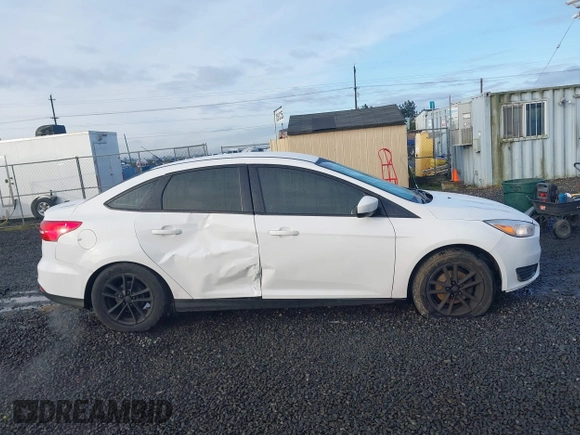 2018 Ford Focus SE with VIN 1FADP3F23JL242066, listed as a IAAI auction lot 41804512 with 99,662 mi miles. Bid and sale history available at carsss.com. Image 13.