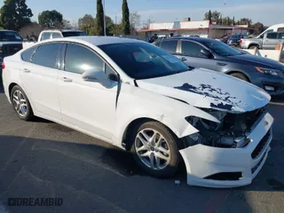 2016 Ford Fusion SE with VIN 3FA6P0H71GR384099, listed as a IAAI auction lot 41434420 with 174,849 mi miles. Bid and sale history available at carsss.com. Image 1.