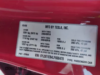 2020 Tesla Model 3 Long Range with VIN 5YJ3E1EB4LF668470, listed as a IAAI auction lot 41743651 with 151,957 mi miles. Bid and sale history available at carsss.com. Image 9.