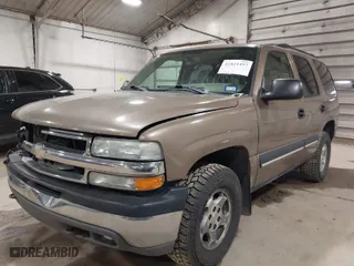 2004 Chevrolet Tahoe LS with VIN 1GNEK13Z34J166486, listed as a IAAI auction lot 41821497 with 164,388 mi miles. Bid and sale history available at carsss.com. Image 2.