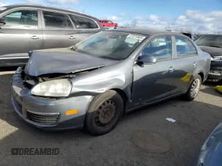 2009 Volkswagen Jetta z VIN 3VWHZ71KX9M011693, wystawiony jako Copart lot #87076904 z przebiegiem 157 478 mil mil oraz Szkoda całkowita • Salvage title. Historia ofert i sprzedaży dostępna na DreamBid. Obrazek 1.