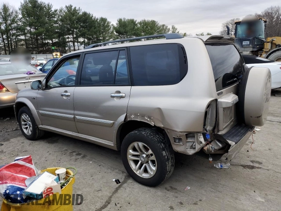 2004 Suzuki XL7 LX z VIN JS3TX92V744100442, wystawiony jako Copart lot #84847614 z przebiegiem 82 751 mil mil oraz Szkody całkowita. Historia ofert i sprzedaży dostępna na DreamBid. Obrazek 2.