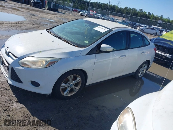 2014 Ford Focus SE with VIN 1FADP3F20EL150757, listed as a IAAI auction lot 41984703 with 171,603 mi miles. Bid and sale history available at carsss.com. Image 2.