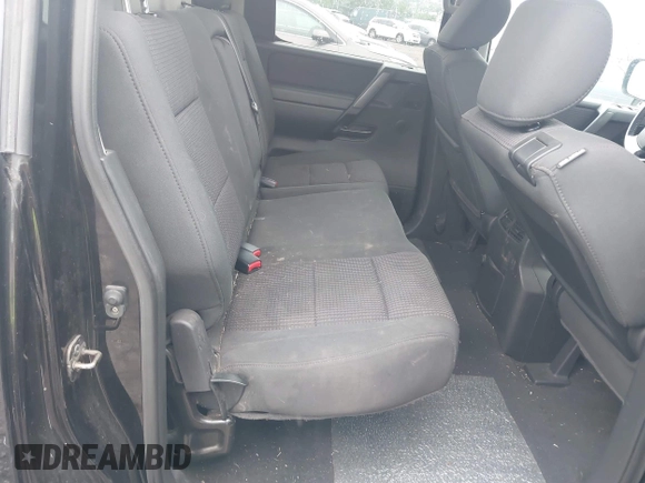 2011 Nissan Titan Pro-4X with VIN 1N6BA0ECXBN319157, listed as a IAAI auction lot 42456725 with 169,434 mi miles and . Bid and sale history available at DreamBid. Image 8.