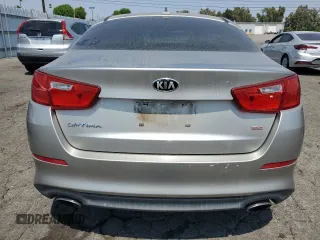 2014 Kia Optima LX with VIN KNAGM4A70E5470266, listed as a Copart auction lot 65084275 with 144,497 mi miles and Clean title. Bid and sale history available at DreamBid. Image 6.