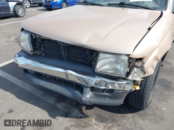 1999 Toyota Tacoma with VIN 4TAVL52N4XZ478703, listed as a IAAI auction lot 42504706 with 34,389 mi miles and . Bid and sale history available at DreamBid. Image 6.