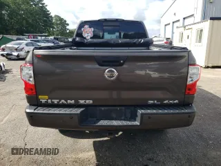 2017 Nissan Titan XD SL with VIN 1N6BA1F44HN510174, listed as a Copart auction lot 63245694 with 121,868 mi miles and Salvage Title. Bid and sale history available at carsss.com. Image 6.