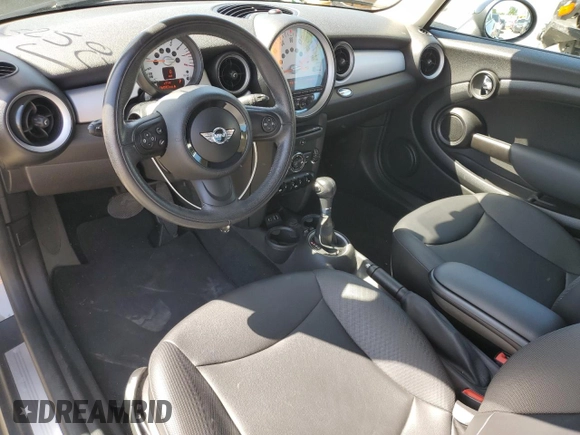 2013 MINI Hardtop with VIN WMWSU3C57DT678736, listed as a Copart auction lot 52586285 with 64,563 mi miles and Salvage Title. Bid and sale history available at DreamBid. Image 8.
