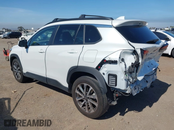 2022 Toyota Corolla Cross XLE with VIN 7MUEAAAG4NV027314, listed as a IAAI auction lot 42701907 with 30,275 mi miles and . Bid and sale history available at DreamBid. Image 3.