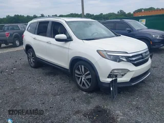 2017 Honda Pilot Elite with VIN 5FNYF6H02HB092945, listed as a IAAI auction lot 42659199 with 98,516 mi miles and . Bid and sale history available at DreamBid. Image 1.