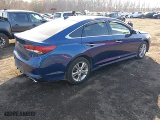 2019 Hyundai Sonata Sport with VIN 5NPE34AFXKH792154, listed as a IAAI auction lot 41328069 with 68,504 mi miles. Bid and sale history available at carsss.com. Image 4.