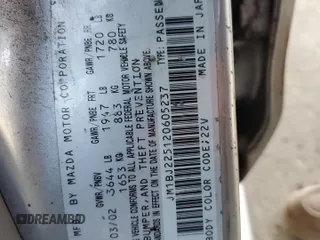 2002 Mazda Protege DX with VIN JM1BJ225120605237, listed as a Copart auction lot 49331225 with 184,556 mi miles and Salvage Title. Bid and sale history available at DreamBid. Image 14.