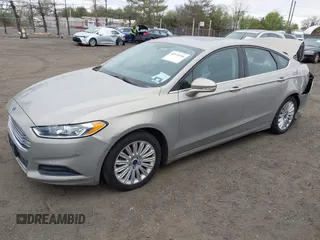2015 Ford Fusion SE Hybrid with VIN 3FA6P0LU6FR210606, listed as a IAAI auction lot 42070466 with 123,043 mi miles and . Bid and sale history available at DreamBid. Image 2.