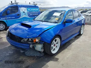 2009 Subaru WRX w/Premium Pkg z VIN JF1GE76619G521520, wystawiony jako IAAI lot #41577390 z przebiegiem 149 257 mil mil oraz . Historia ofert i sprzedaży dostępna na DreamBid. Obrazek 2.