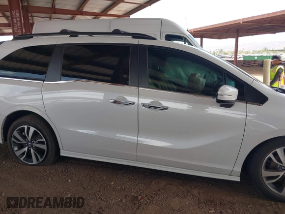 2021 Honda Odyssey Touring z VIN 5FNRL6H85MB034888, wystawiony jako IAAI lot #42386984 z przebiegiem 40 514 mil mil oraz . Historia ofert i sprzedaży dostępna na DreamBid. Obrazek 13.