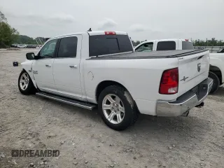 2018 Ram 1500 Lone Star Silver with VIN 1C6RR6LT6JS266013, listed as a Copart auction lot 56895915 with 136,453 mi miles and Salvage title. Bid and sale history available at DreamBid. Image 2.