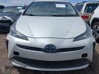 2022 Toyota Prius L Eco with VIN JTDKAMFUXN3181752, listed as a IAAI auction lot 42015717 with 129,637 mi miles and . Bid and sale history available at DreamBid. Image 12.