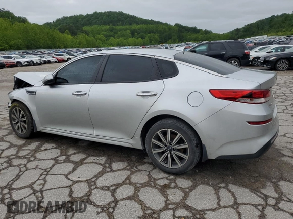 2019 Kia Optima LX with VIN 5XXGT4L3XKG360090, listed as a Copart auction lot 57661405 with 84,493 mi miles and Salvage title. Bid and sale history available at DreamBid. Image 2.