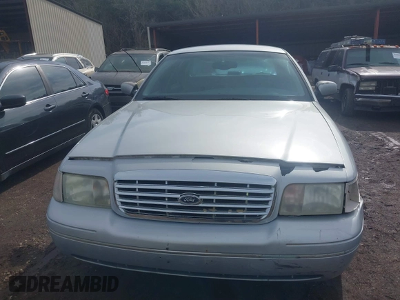 2001 Ford Crown Victoria LX с VIN 2FAFP74W21X143151, выставлен на аукционе IAAI как лот 41471923 с пробегом 207 583 миль миль и . История ставок и продаж доступна на DreamBid. Изображение 6.