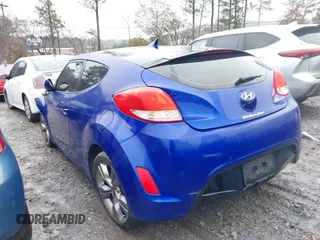 2012 Hyundai Veloster w/Gray Int with VIN KMHTC6AD4CU071378, listed as a IAAI auction lot 41010560 with 158,208 mi miles. Bid and sale history available at carsss.com. Image 3.
