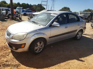 2009 Kia Rio SX with VIN KNADE223696505084, listed as a Copart auction lot 75699614 with 0 mi miles and Salvage Title. Bid and sale history available at carsss.com. Image 1.