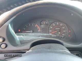 1999 Mitsubishi 3000GT z VIN JA3AM44H2XY001614, wystawiony jako Copart lot #77580444 z przebiegiem 128 948 mil mil oraz Tytuł czysty. Historia ofert i sprzedaży dostępna na DreamBid. Obrazek 9.