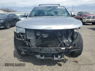 2018 Jeep Grand Cherokee Laredo E with VIN 1C4RJFAG0JC351090, listed as a Copart auction lot 52958635 with 96,956 mi miles and Salvage Title. Bid and sale history available at DreamBid. Image 5.