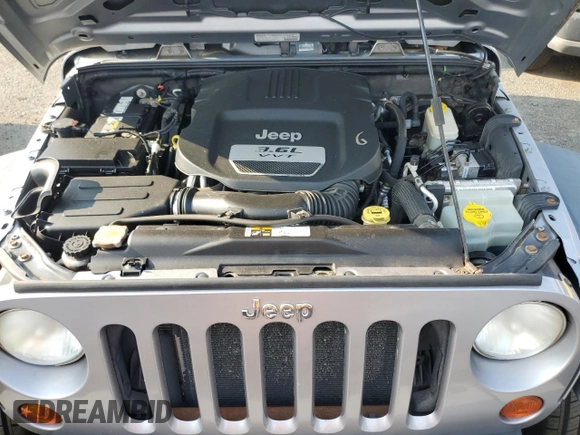 2013 Jeep Wrangler Sport with VIN 1C4AJWAG7DL635639, listed as a Copart auction lot 67182975 with 101,576 mi miles and Clean title. Bid and sale history available at DreamBid. Image 12.