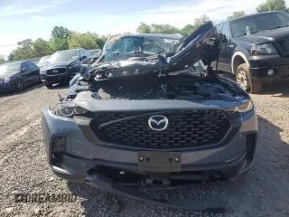 2025 Mazda CX-50 S Premium Plus with VIN 7MMVABEM1SN319228, listed as a Copart auction lot 55958135 with 4,133 mi miles and Salvage title. Bid and sale history available at DreamBid. Image 5.