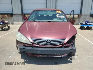 2005 Toyota Camry STD z VIN 4T1BE32K85U429361, wystawiony jako Copart lot #59214715 z przebiegiem 284 988 mil mil oraz Nie do naprawy • Non repairable. Historia ofert i sprzedaży dostępna na DreamBid. Obrazek 5.