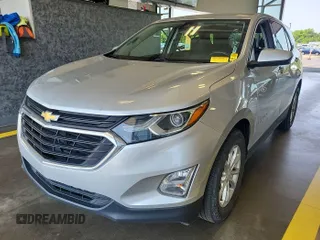 2020 Chevrolet Equinox LT with VIN 2GNAXJEV0L6236404, listed as a IAAI auction lot 42619695 with 77,124 mi miles and . Bid and sale history available at DreamBid. Image 14.