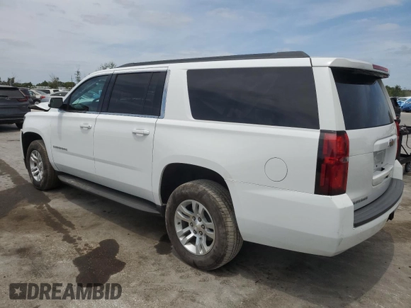 2018 Chevrolet Suburban LS z VIN 1GNSCGKC6JR379977, wystawiony jako Copart lot #54351685 z przebiegiem 138 574 mil mil oraz Szkoda całkowita • Salvage title. Historia ofert i sprzedaży dostępna na DreamBid. Obrazek 2.