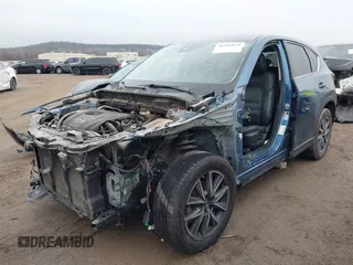 2017 Mazda CX-5 Grand Touring with VIN JM3KFADL9H0187338, listed as a IAAI auction lot 41382034 with 141,972 mi miles and . Bid and sale history available at carsss.com. Image 20.