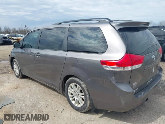 2014 Toyota Sienna XLE with VIN 5TDYK3DC4ES463315, listed as a IAAI auction lot 42108050 with 197,140 mi miles. Bid and sale history available at carsss.com. Image 3.