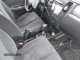 2009 Nissan Versa S with VIN 3N1BC13EX9L360229, listed as a IAAI auction lot 41280647 with 209,974 mi miles and . Bid and sale history available at carsss.com. Image 5.
