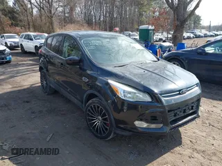 2014 Ford Escape SE with VIN 1FMCU9GXXEUA57133, listed as a IAAI auction lot 41642184 with 1 mi miles. Bid and sale history available at carsss.com. Image 1.