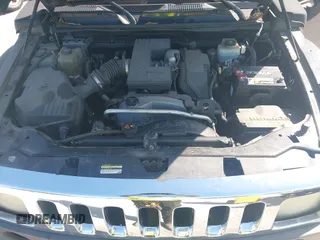 2007 Hummer H3 SUV with VIN 5GTDN13E878233953, listed as a IAAI auction lot 42012596 with 232,919 mi miles. Bid and sale history available at carsss.com. Image 10.