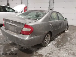 2004 Toyota Camry LE with VIN 4T1BF30K54U578096, listed as a IAAI auction lot 41528597 with 226,027 mi miles. Bid and sale history available at carsss.com. Image 4.
