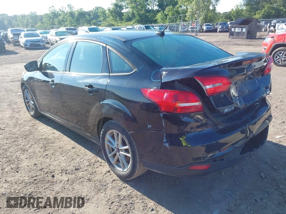 2018 Ford Focus SE with VIN 1FADP3FEXJL286396, listed as a IAAI auction lot 42634912 with 73,769 mi miles and . Bid and sale history available at DreamBid. Image 3.