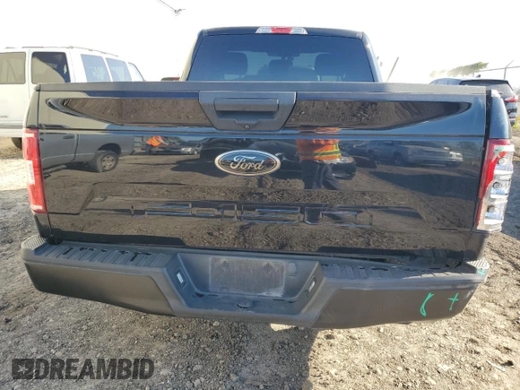2020 Ford F-150 XL with VIN 1FTMF1C5XLKF15450, listed as a Copart auction lot 79884874 with 32,575 mi miles and Salvage Title. Bid and sale history available at carsss.com. Image 6.