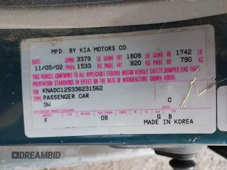 2003 Kia Rio with VIN KNADC125336231562, listed as a IAAI auction lot 41386659 with 87,965 mi miles. Bid and sale history available at carsss.com. Image 9.