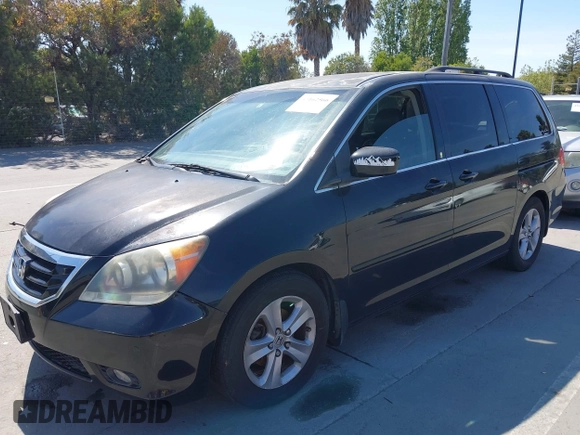 2008 Honda Odyssey Touring with VIN 5FNRL38948B116432, listed as a IAAI auction lot 42162566 with 121,996 mi miles. Bid and sale history available at carsss.com. Image 6.