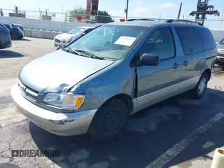1999 Toyota Sienna LE with VIN 4T3ZF13C5XU099020, listed as a IAAI auction lot 41709287 with 206,884 mi miles. Bid and sale history available at carsss.com. Image 18.
