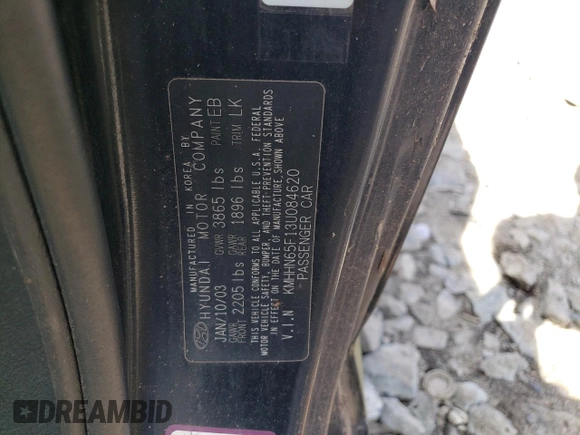 2003 Hyundai Tiburon GT z VIN KMHHN65F13U084620, wystawiony jako Copart lot #46880185 z przebiegiem Nie podano mil oraz Nie do naprawy • Non repairable. Historia ofert i sprzedaży dostępna na DreamBid. Obrazek 12.