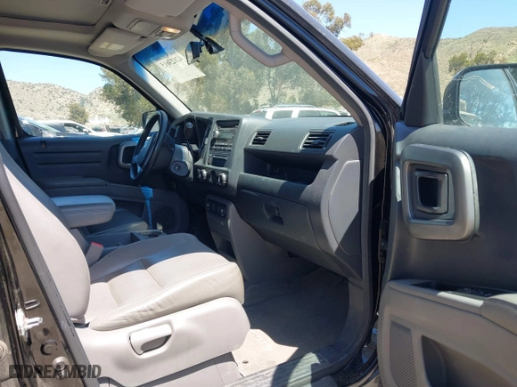 2011 Honda Ridgeline RTL with VIN 5FPYK1F50BB001442, listed as a IAAI auction lot 42023615 with 189,170 mi miles. Bid and sale history available at carsss.com. Image 5.