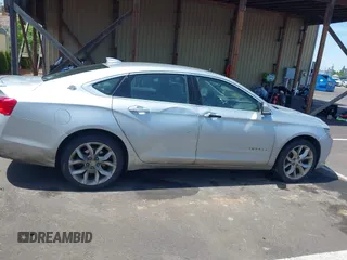 2017 Chevrolet Impala LT with VIN 2G1105S31H9197165, listed as a IAAI auction lot 42303730 with 232,046 mi miles and . Bid and sale history available at DreamBid. Image 13.