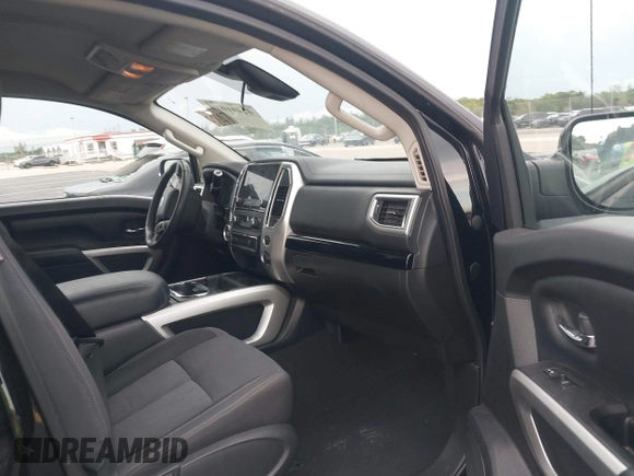 2021 Nissan Titan SV with VIN 1N6AA1EF4MN503458, listed as a IAAI auction lot 42401074 with 53,558 mi miles and . Bid and sale history available at DreamBid. Image 5.