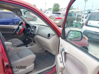 2001 Toyota RAV4 with VIN JTEGH20V710009113, listed as a IAAI auction lot 42813771 with 186,955 mi miles and . Bid and sale history available at DreamBid. Image 5.