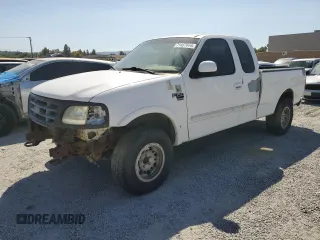 2000 Ford F-150 XL with VIN 1FTRX18LXYKA44854, listed as a Copart auction lot 71467644 with 0 mi miles and Salvage Title. Bid and sale history available at carsss.com. Image 1.